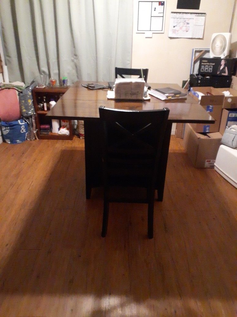 Dinette Table....wine Rack, 2 Shelves On Side, 2 Drawers On Botton, Leaf Folds Down On Both Ends.