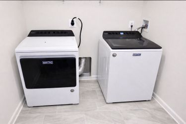 One year old washer and electric dryer