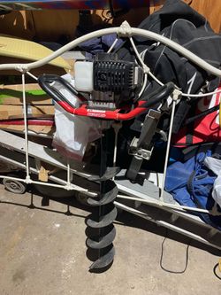 Gas powered post hole digger