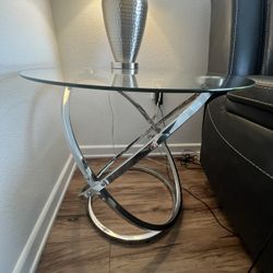 2 Glass End Tables And A Coffee Table