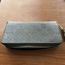 Authentic Louis Vuitton Clémence Zip Wallet – Black Empreinte Leather