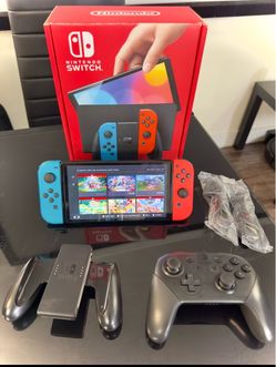 Nintendo Switch – OLED Model w/Neon Red & Neon Blue Joy-Con