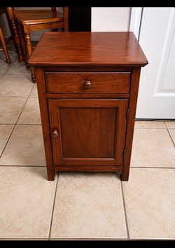 Wood piece of furniture with storage