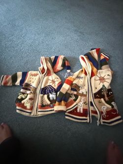 Matching kid’s sweaters with appliqué