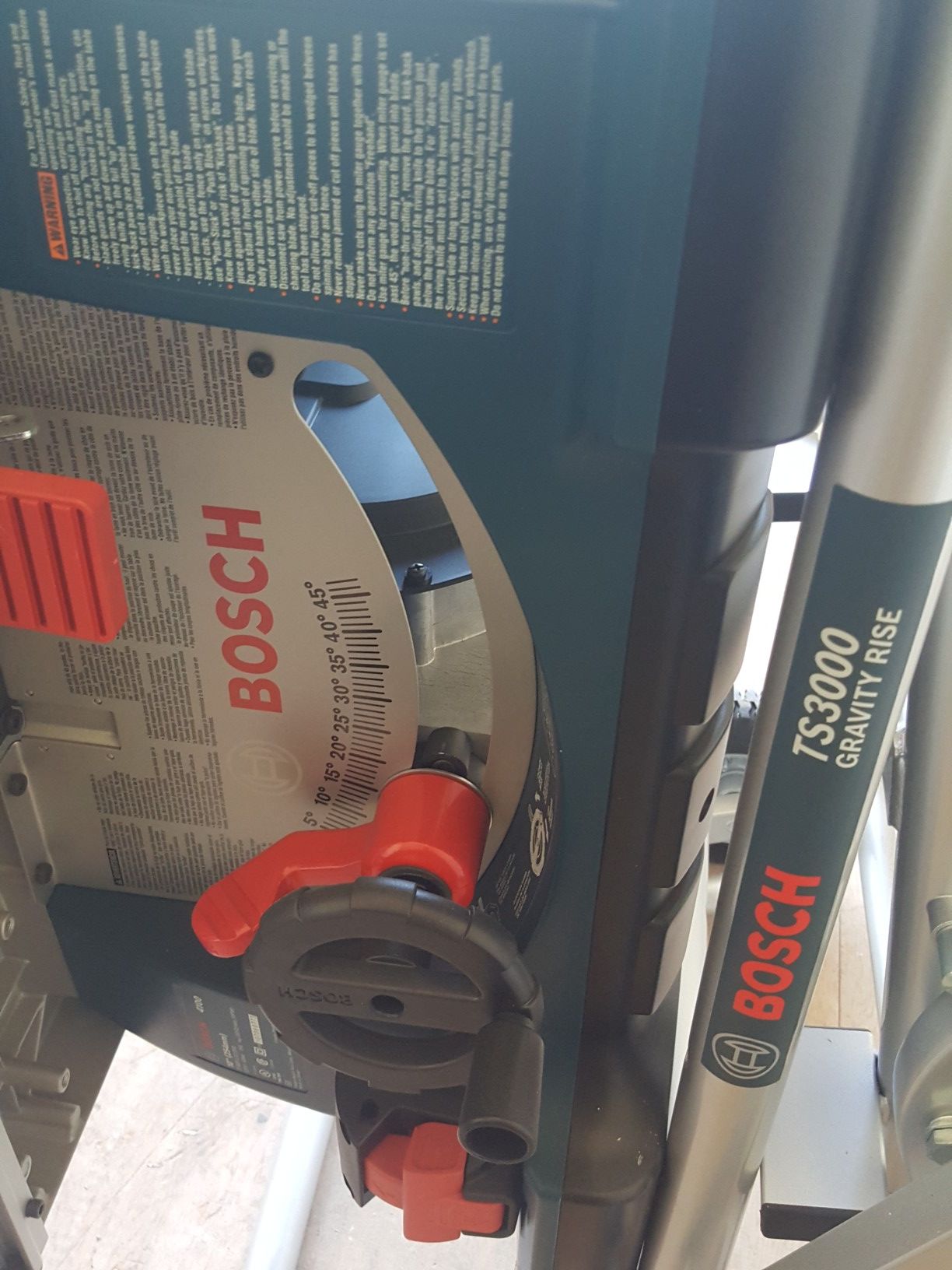 Used Bosch TS3000 Worksite Table Saw with Gravity Rise Wheeled Stand.