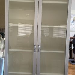 Tall white cabinet with grey glass doors 31.5wx12dx79.5h