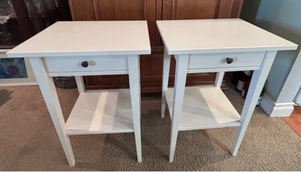 Two white matching IKEA night stands