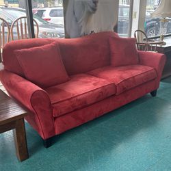 Red Two Cushion Couch With 2 Throw Pillows 