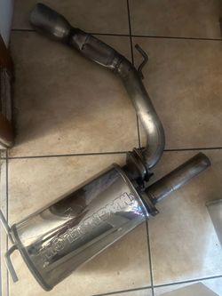 Muffler magnaflow,performance sports, es husado pero esta bueno y lo Remato