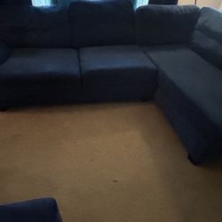 Blue Couch With Ottoman . 