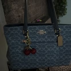 Denim coach purse with Cherries