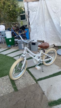 Kid’s Bicycle beautiful style petimini brand nice color brown and white 16” high arms everything works well