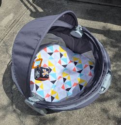 Fisher-Price Portable Bassinet On-The-Go Baby Dome, Travel Play Space with Developmental Newborn Toys & Canopy