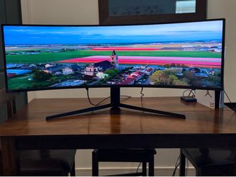 The Samsung Odyssey Neo G9. 49 inch
