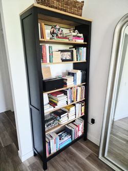 Tall 6-shelf black bookcase with light wood shelves, Los Feliz LA