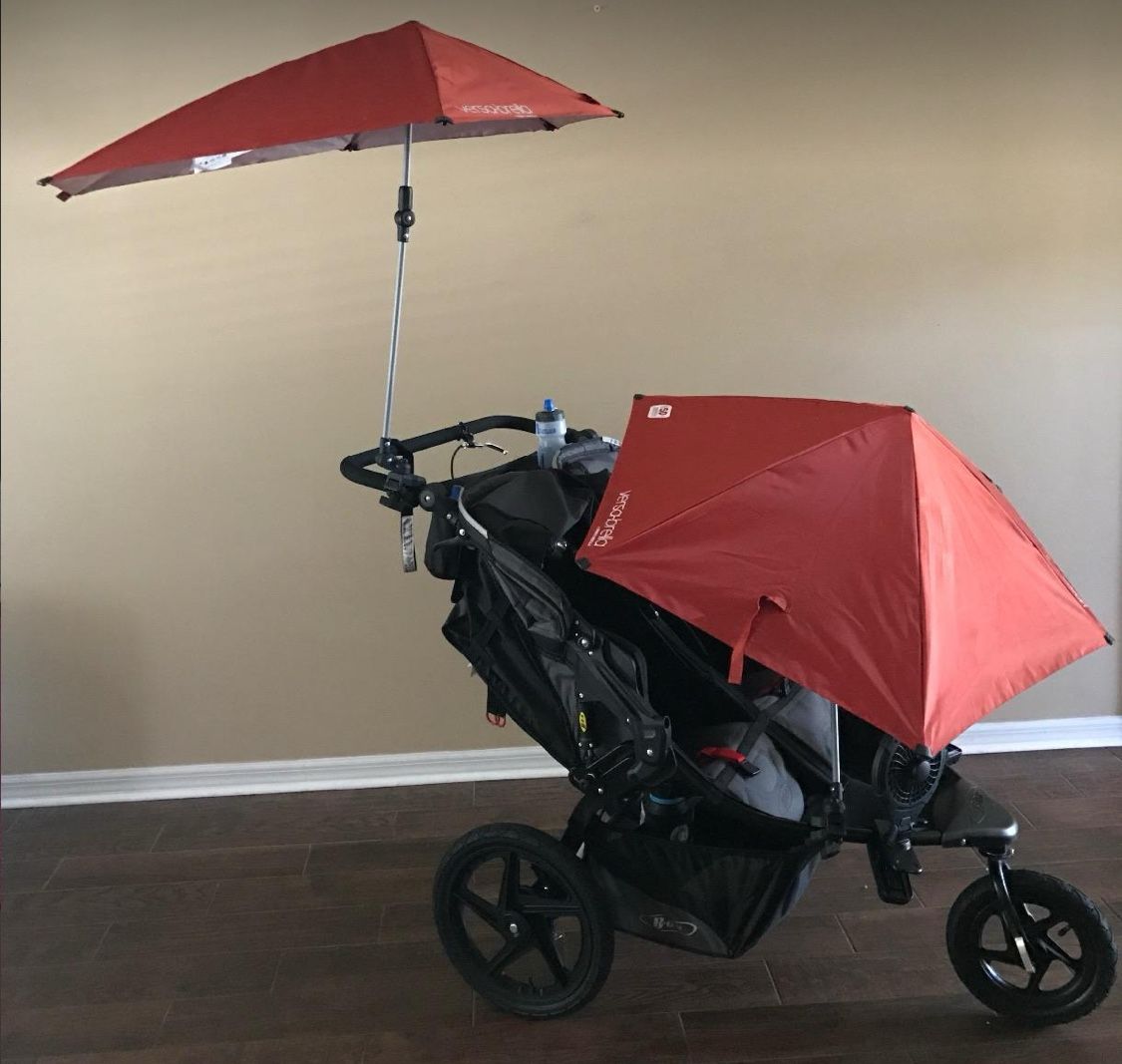 Red Versa Brella portable umbrella - barely Used