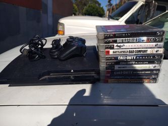 PS3 with controller and 10 games