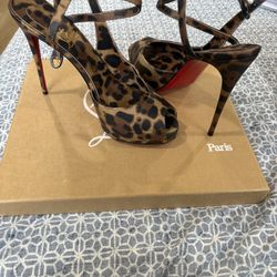 Women’s Size 10 Red Bottoms 