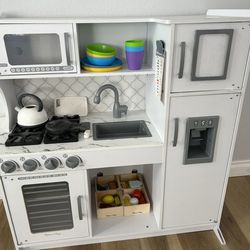 Melissa And Doug Kitchen with food and plates