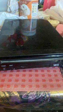 black Nintendo Wii RVL-101 Family Edition home console.