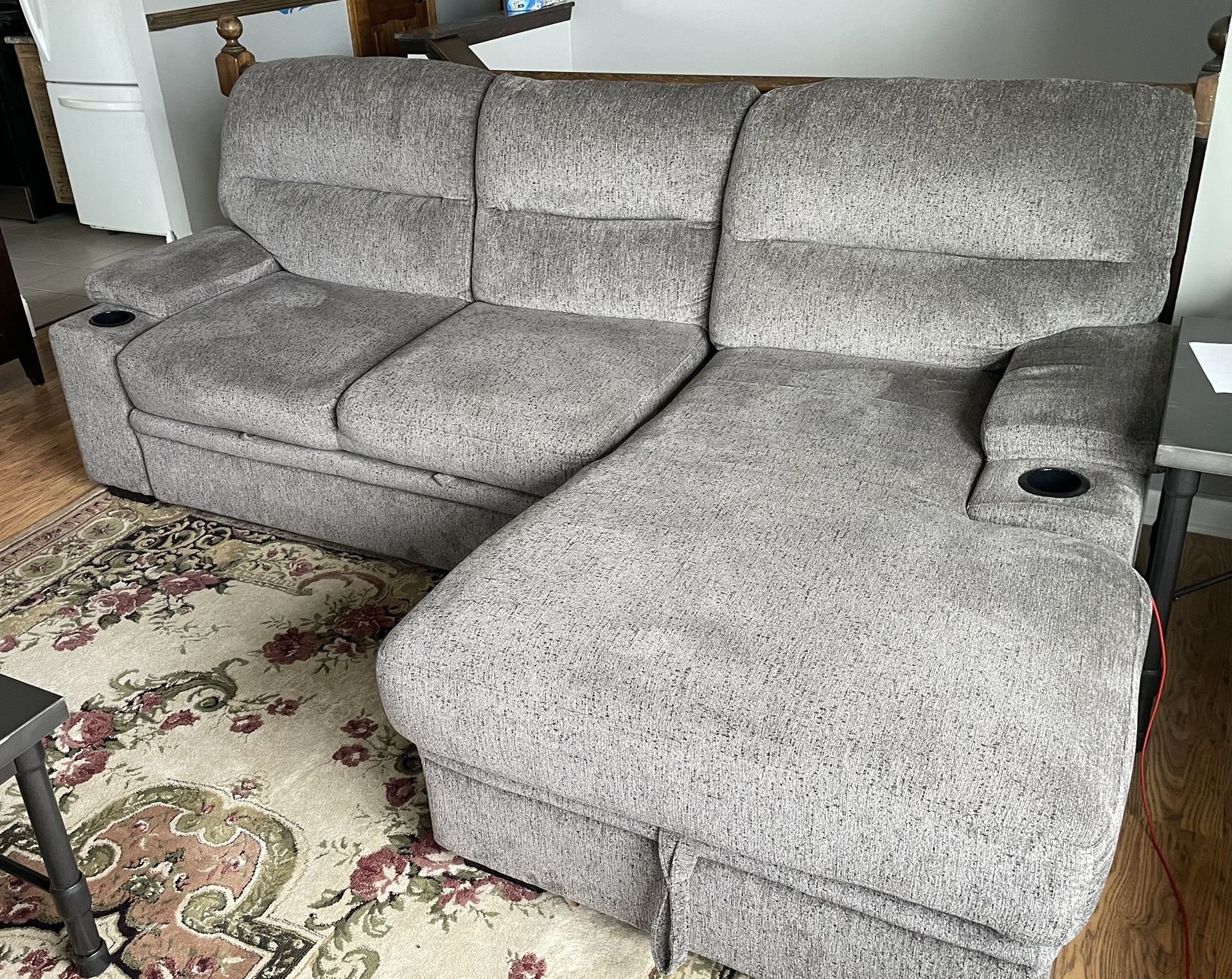 Sectional couch with bed and storage