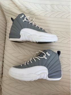 White and gray Jordan’s