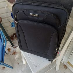 Samsonite Medium Size Luggage  On Wheels 