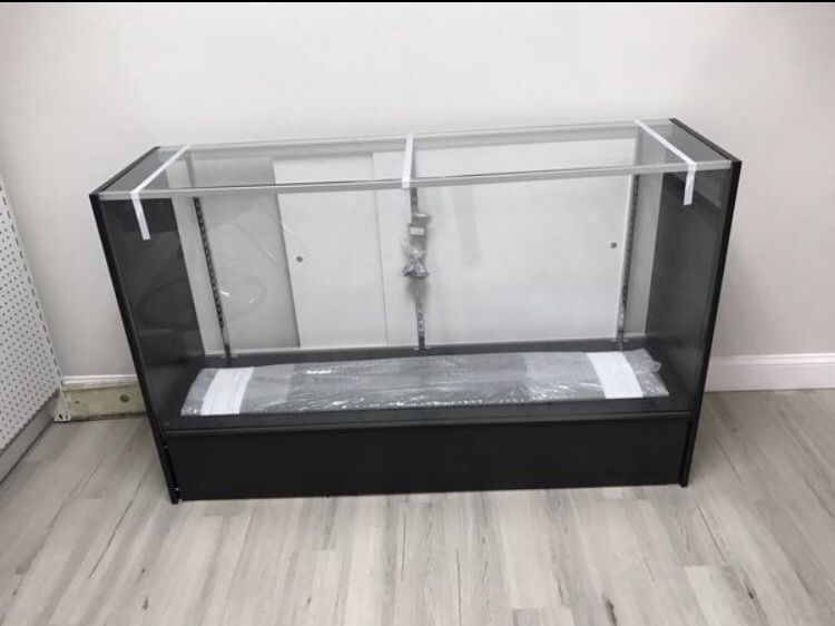 Display case with glass shelves