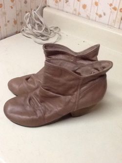 Lightly used Super cute tan colored Leather booties