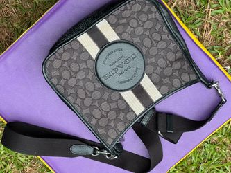 Thompson Crossbody bag features signature jacquard fabric with a bold varsity