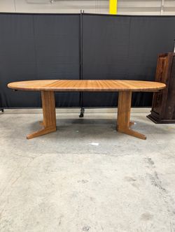 Oval Hardwood Pedestal Dining Table with Extension Leaf