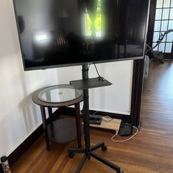 Pioneer 43” 4K UHD Smart TV with rolling stand 