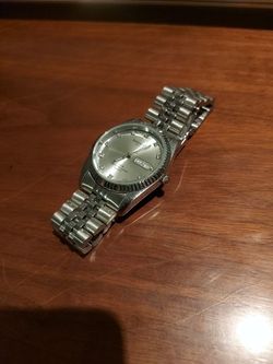 Pre-2000 Vintage Swanson Wristwatch With Stainless Steel Bands And Spanish Days Of The Week