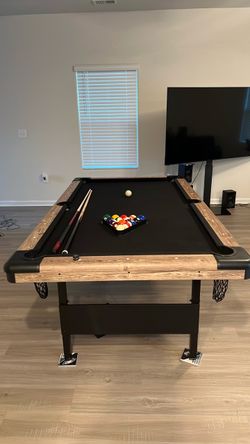 GoSports Pool Table with Balls and Cues and foldable legs