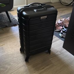Suitcase- Samsonite carry-on w/ Laptop Pocket 