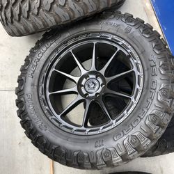 22x10 And 37x13.50R22. TIS TIRES