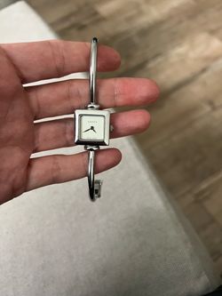 Gucci's vintage square bangle watches.