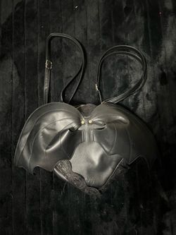 Heart shaped backpack w/ bat wings