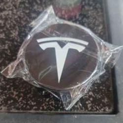 Tesla  CENTER CAP black and silver.
