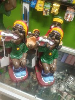 Jamaican figurines one for $13