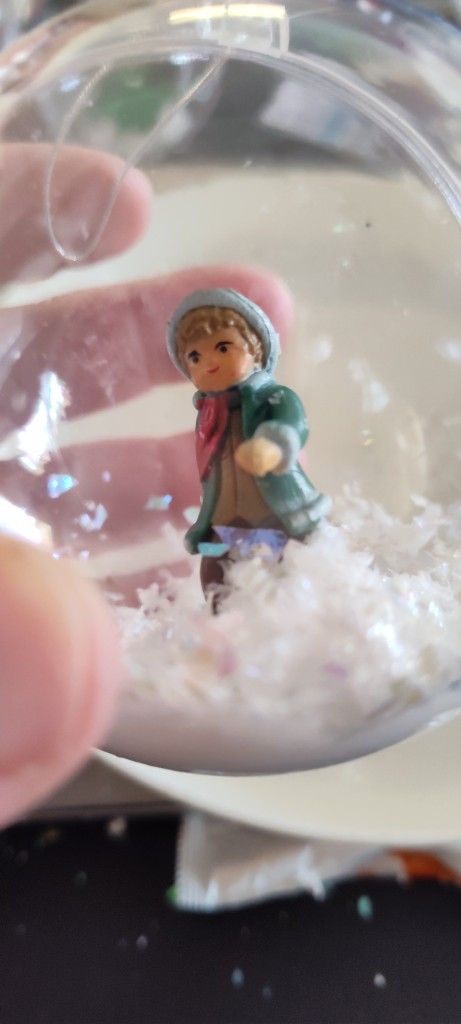 Little Kid Playing In The Snow