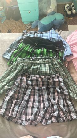 3 hot topic skirts and 1 SO skirt