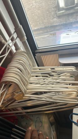 30 + Plastic Clothing Hangers – $6