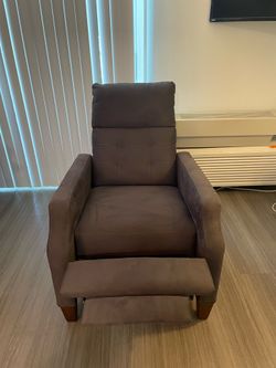 Grey manual recliner chair, new, rarely used, $65 obo