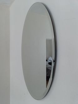 Beveled oval mirror