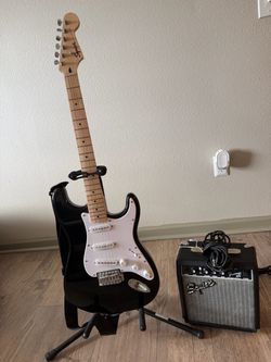 Squier Stratocaster Electric Guitar with Frontman 10G Amp