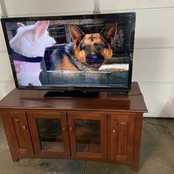 Cherry color Tv Stand With 50 Inch Tv 