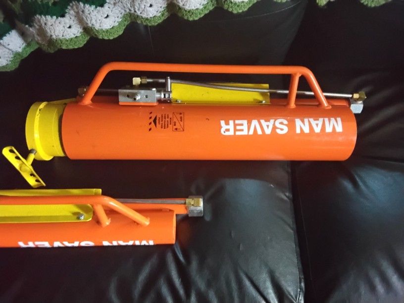 Man SAVER POST HOLE SETTERS