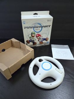 Wii steering wheel with box, manual, and cardboard