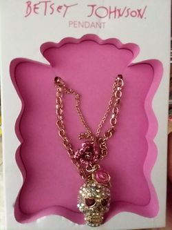 Betsy Johnson skull and rose pendant